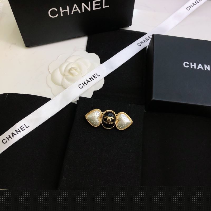 Ch*el brooches
